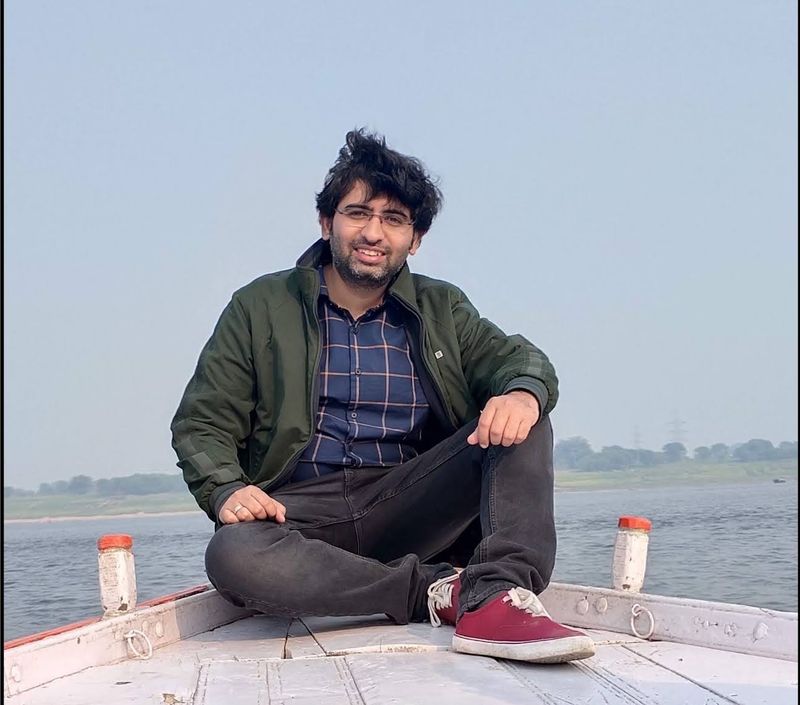Akshay Gulati on a boat on the Ganga